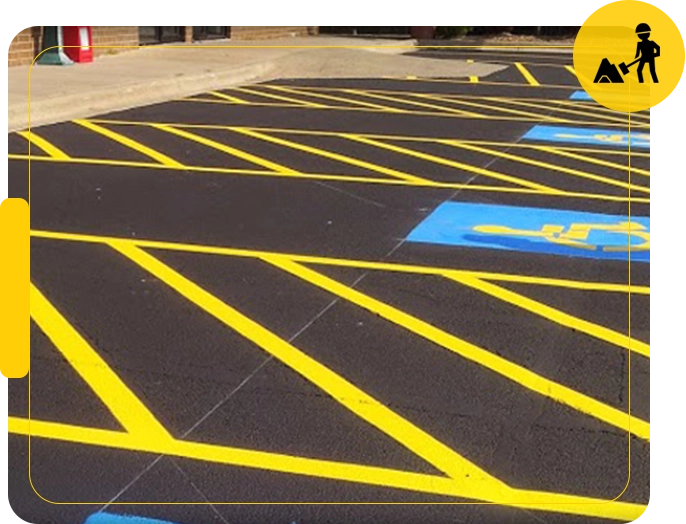 A parking lot with yellow and blue lines on it.